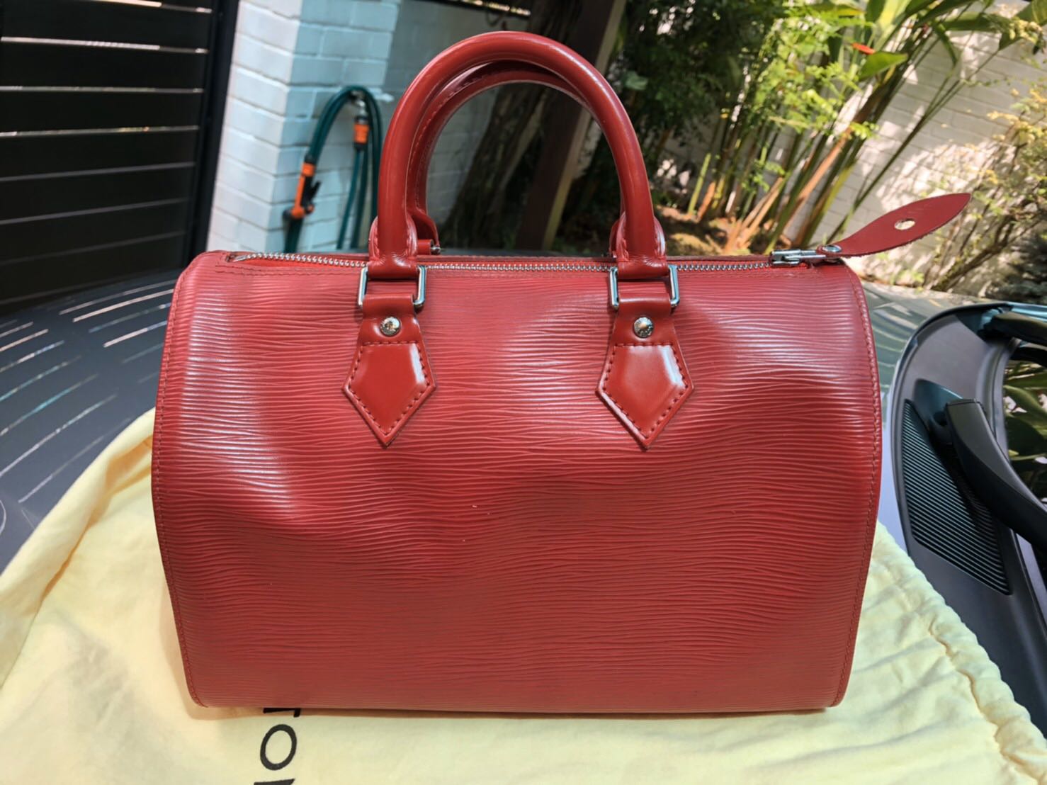 louis vuitton red epi leather speedy 25